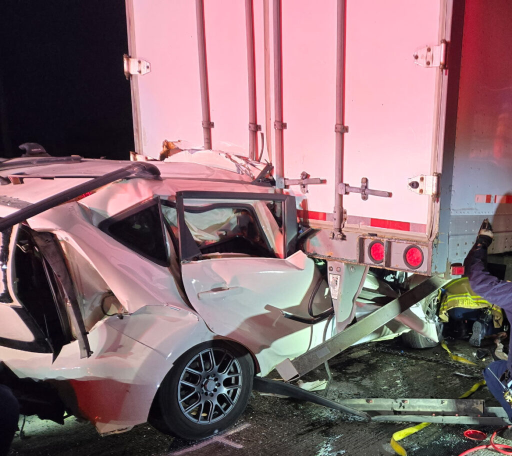 Vehicle crashed into the back of a semi.