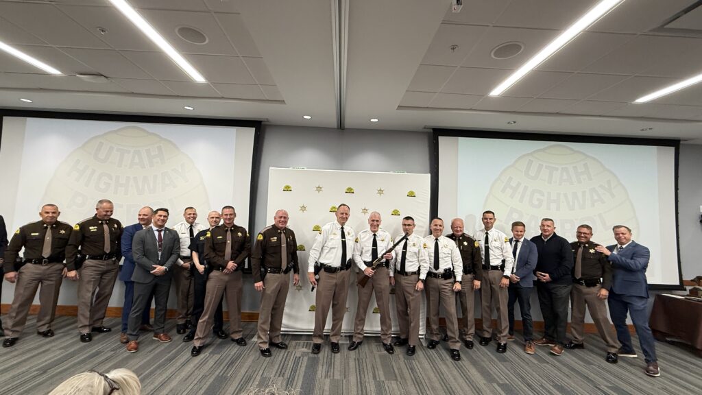 UHP Captains presenting Col. Rapich with his gift.